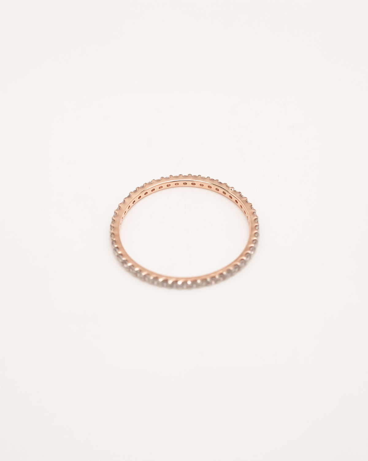 Back view of slim rose gold lab grown diamond pavé eternity band