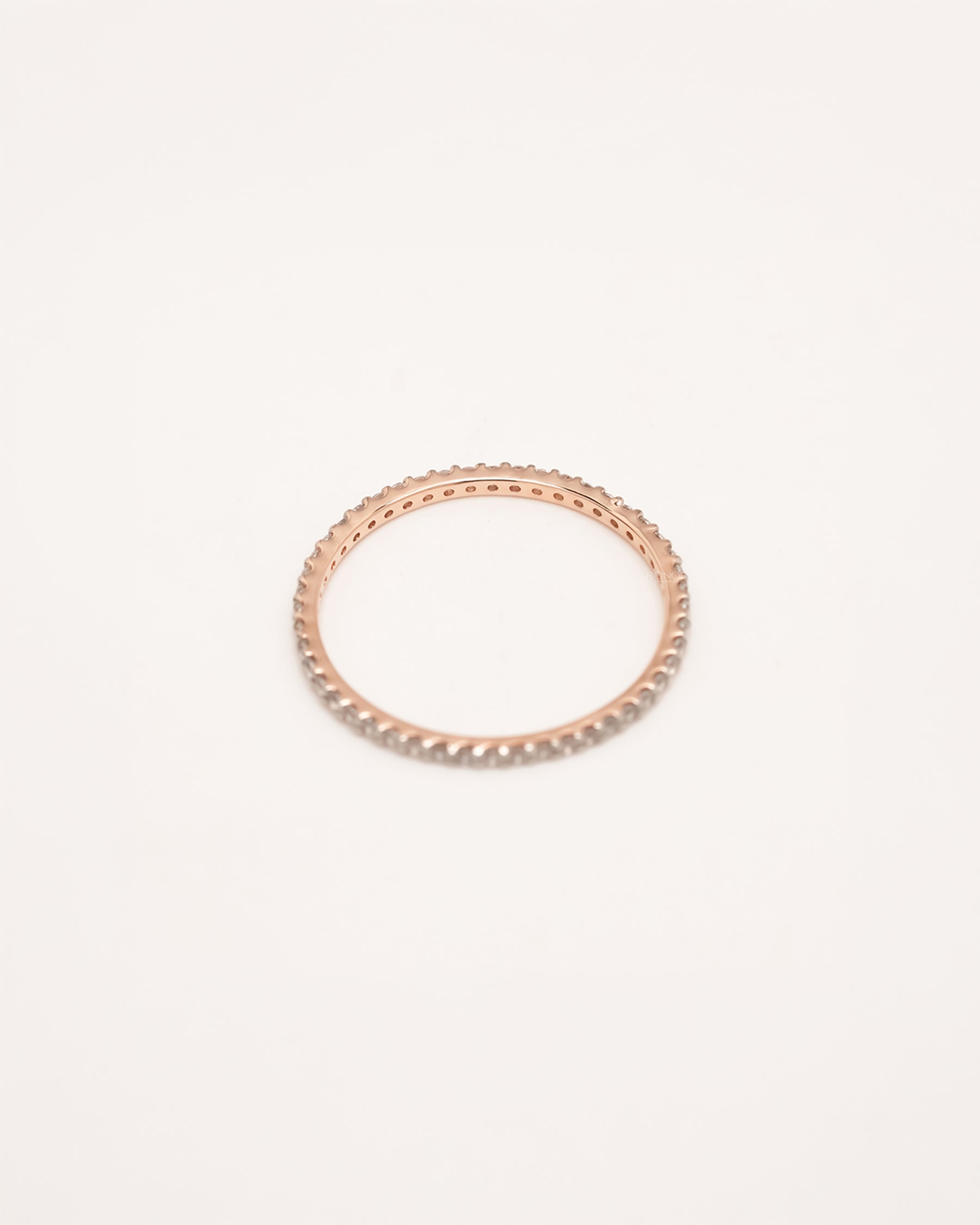 Back view of slim rose gold lab grown diamond pavé eternity band