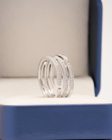 Odette wide lab grown diamond pavé band in white metal inside Ronora box