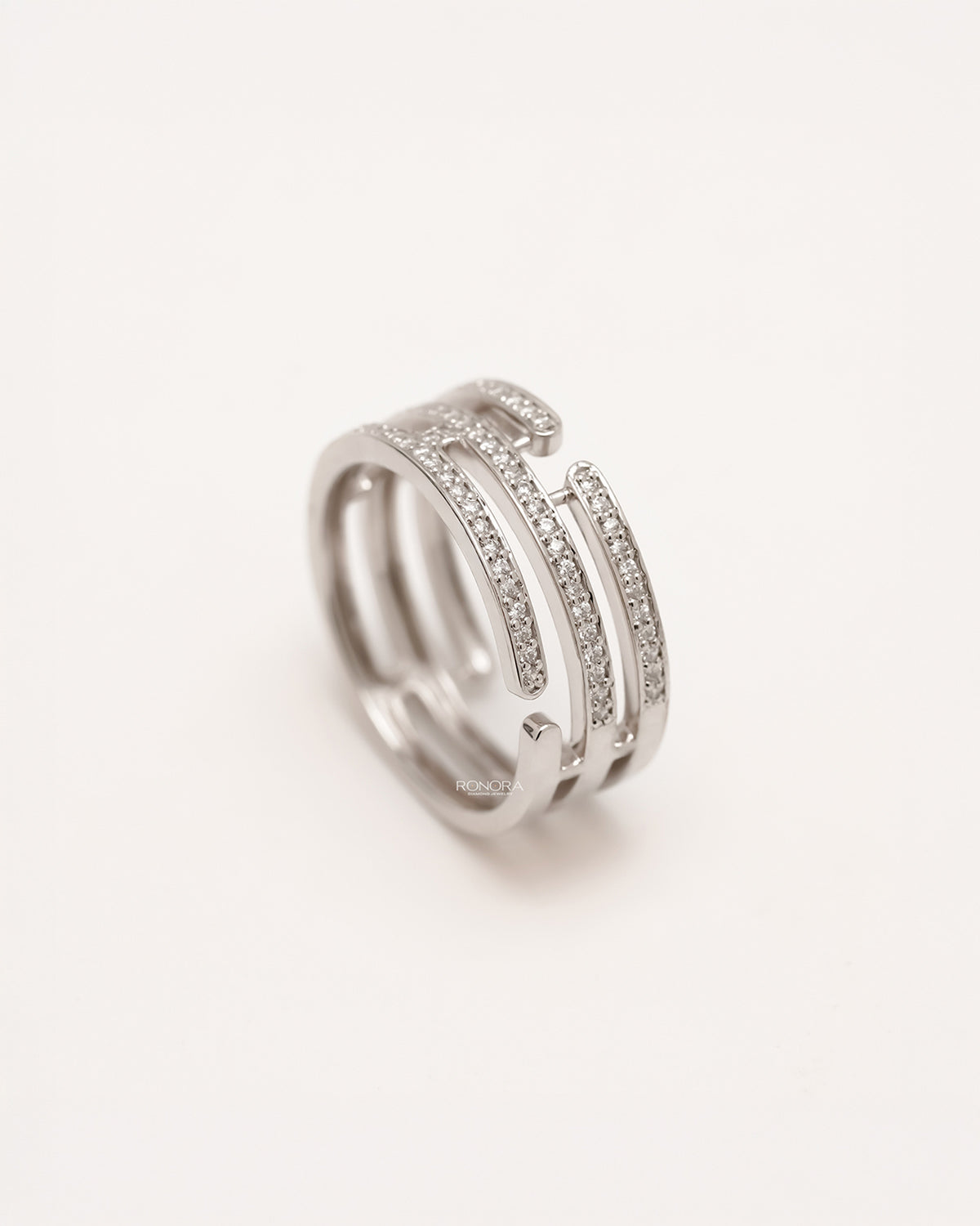 Side profile of wide lab grown diamond pavé band showing multi-row pavé setting