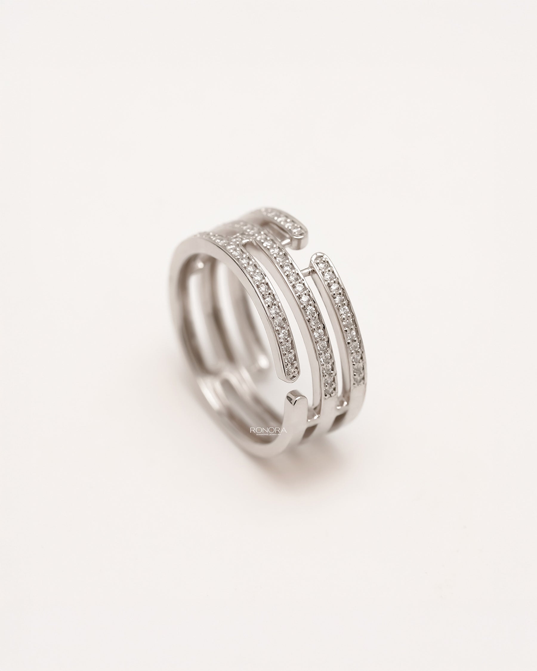 Side profile of wide lab grown diamond pavé band showing multi-row pavé setting