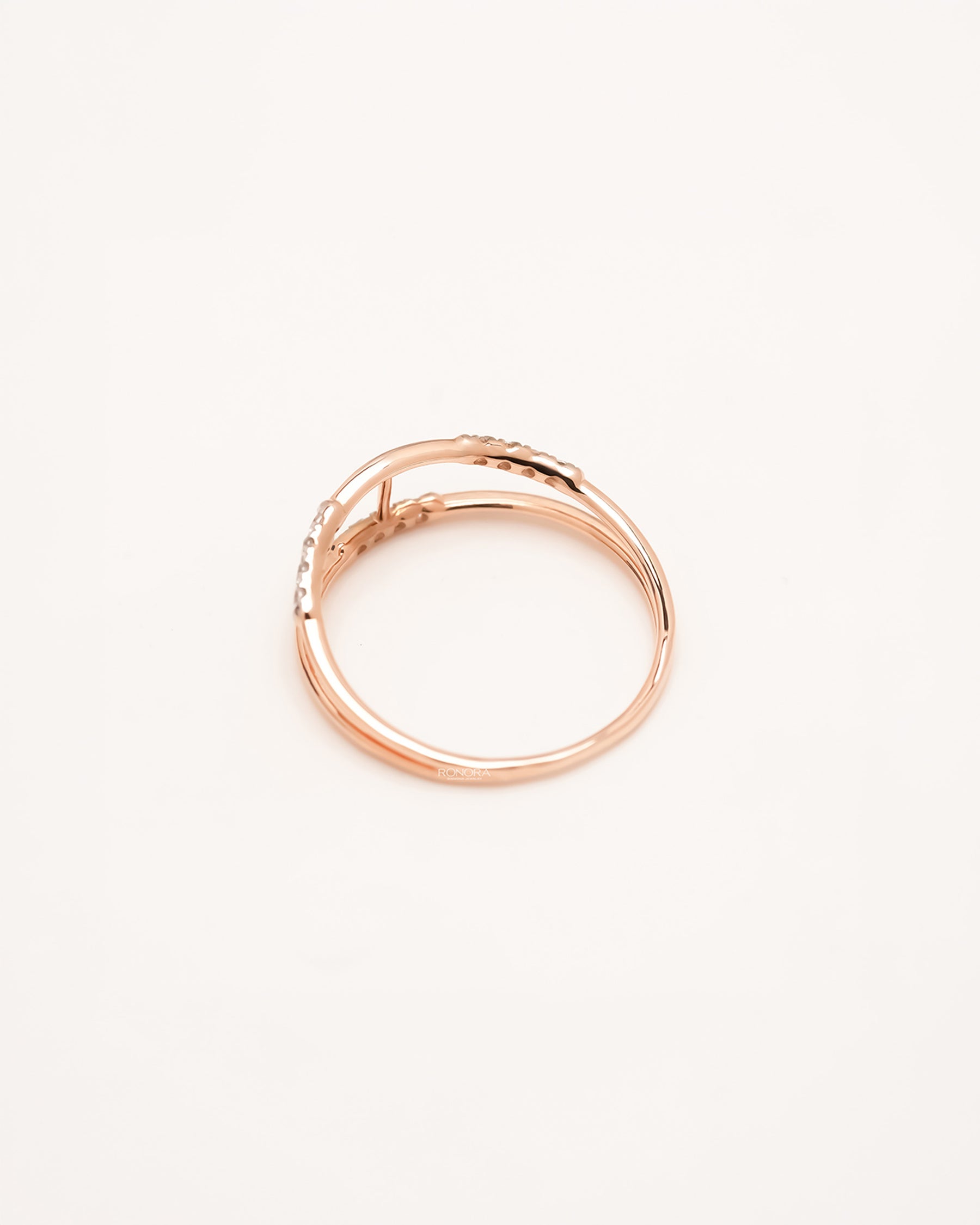 Back view of rose gold open lab grown diamond bypass ring
