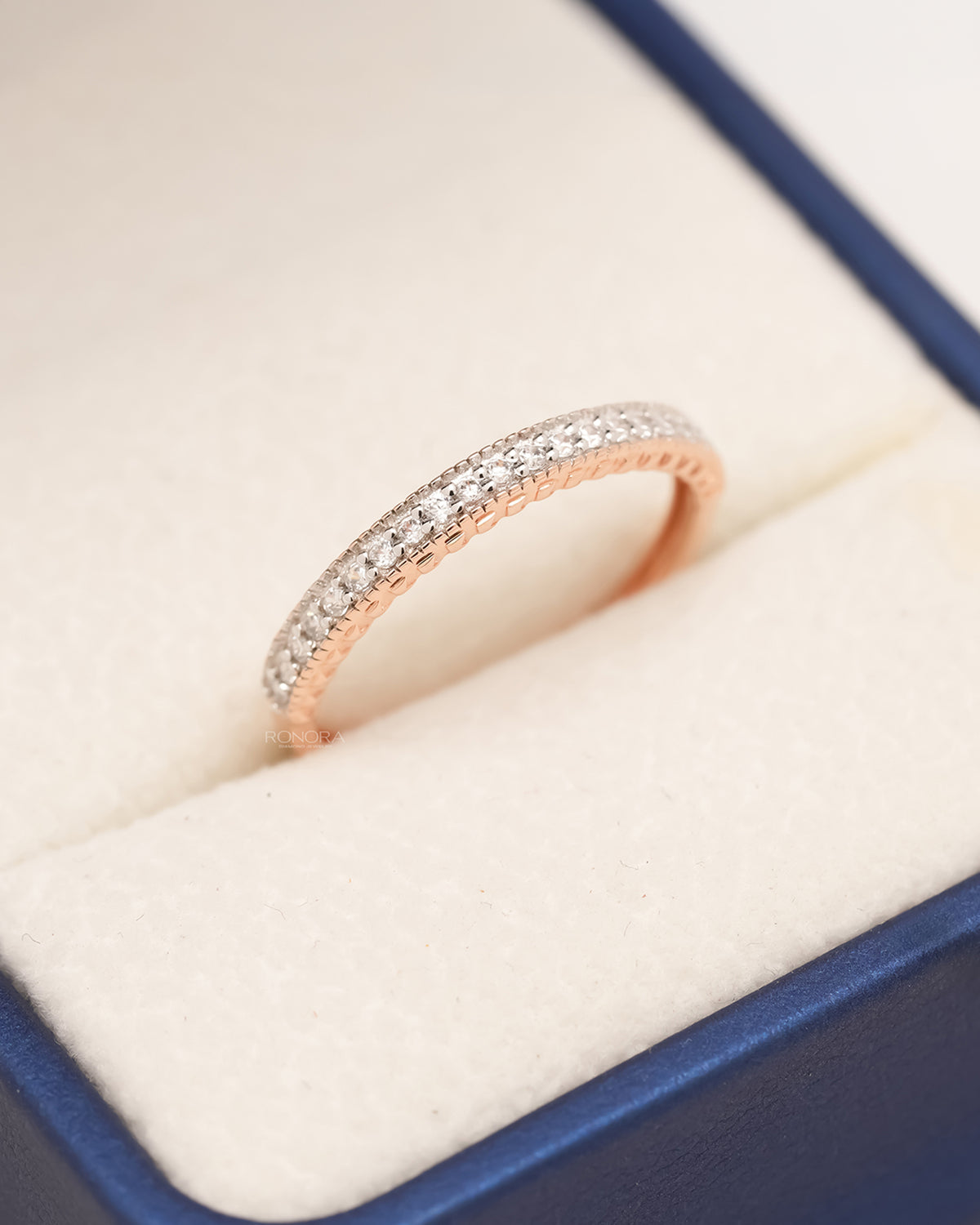Elyra double-row lab grown diamond pavé band in rose gold inside Ronora box