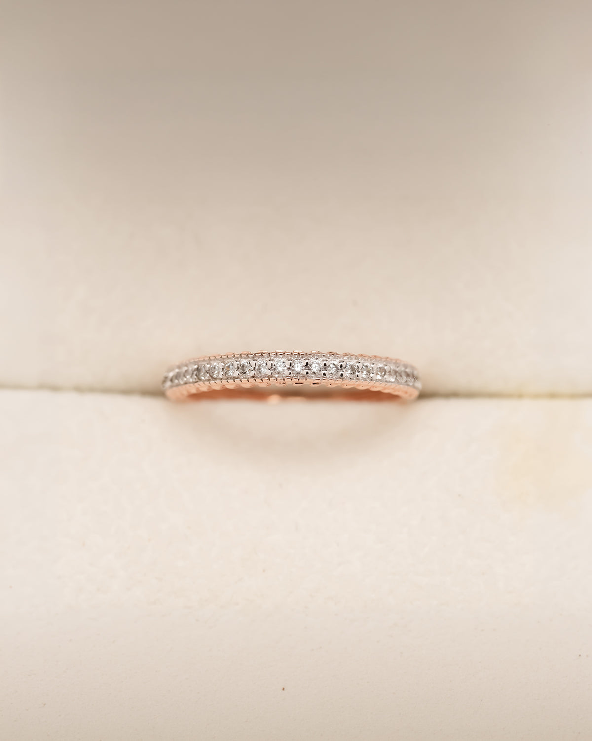 Rose gold double-row pavé band with round lab grown diamonds in Ronora box