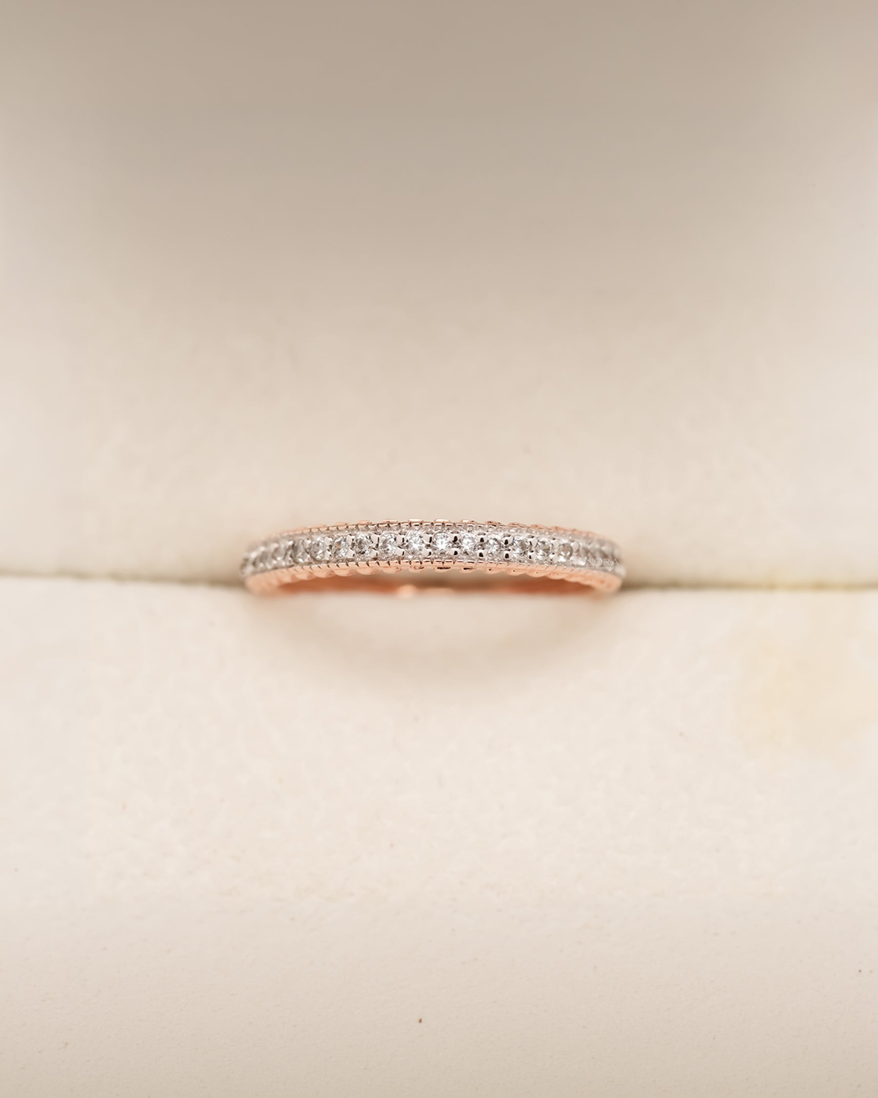 Rose gold double-row pavé band with round lab grown diamonds in Ronora box
