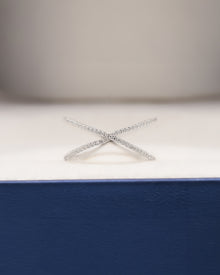 Aurelia white lab grown diamond pavé crossover ring inside Ronora box