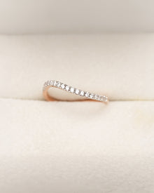 Solenne curved lab grown diamond pavé band in rose gold inside Ronora box