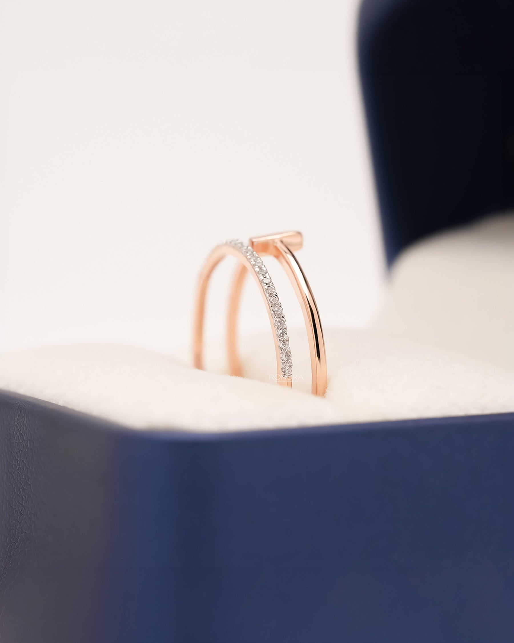 Side profile of open bar lab grown diamond bypass ring showing pavé bypass setting