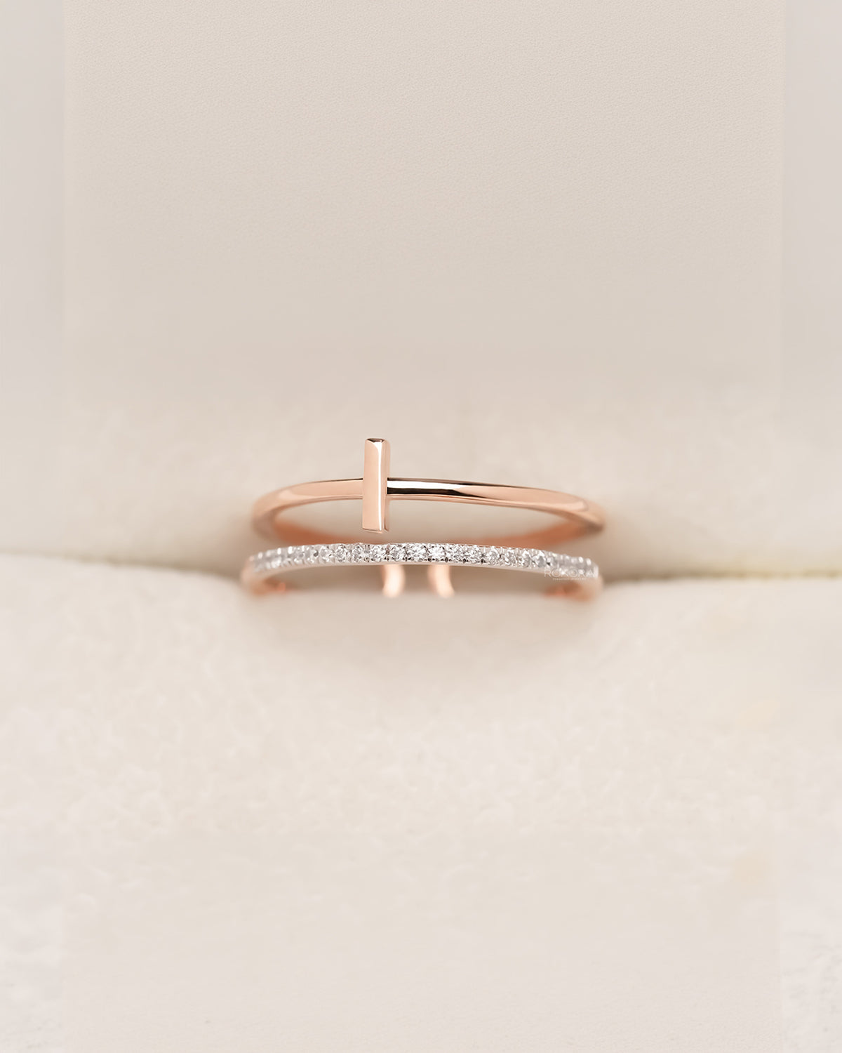 Angled view of open bar lab grown diamond bypass ring showing pavé bypass setting