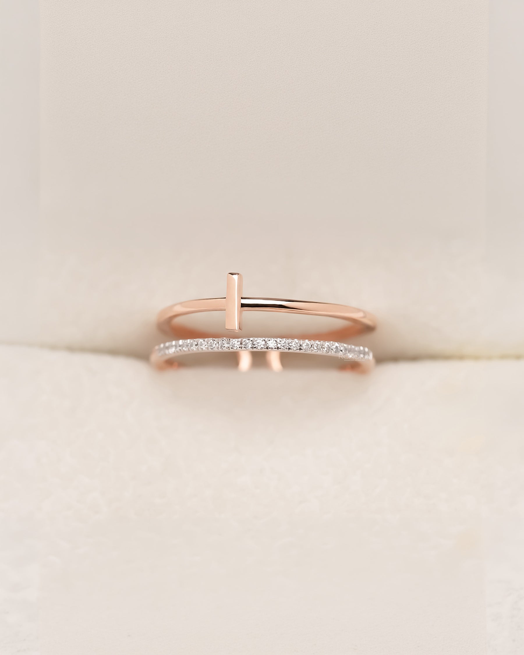 Angled view of open bar lab grown diamond bypass ring showing pavé bypass setting