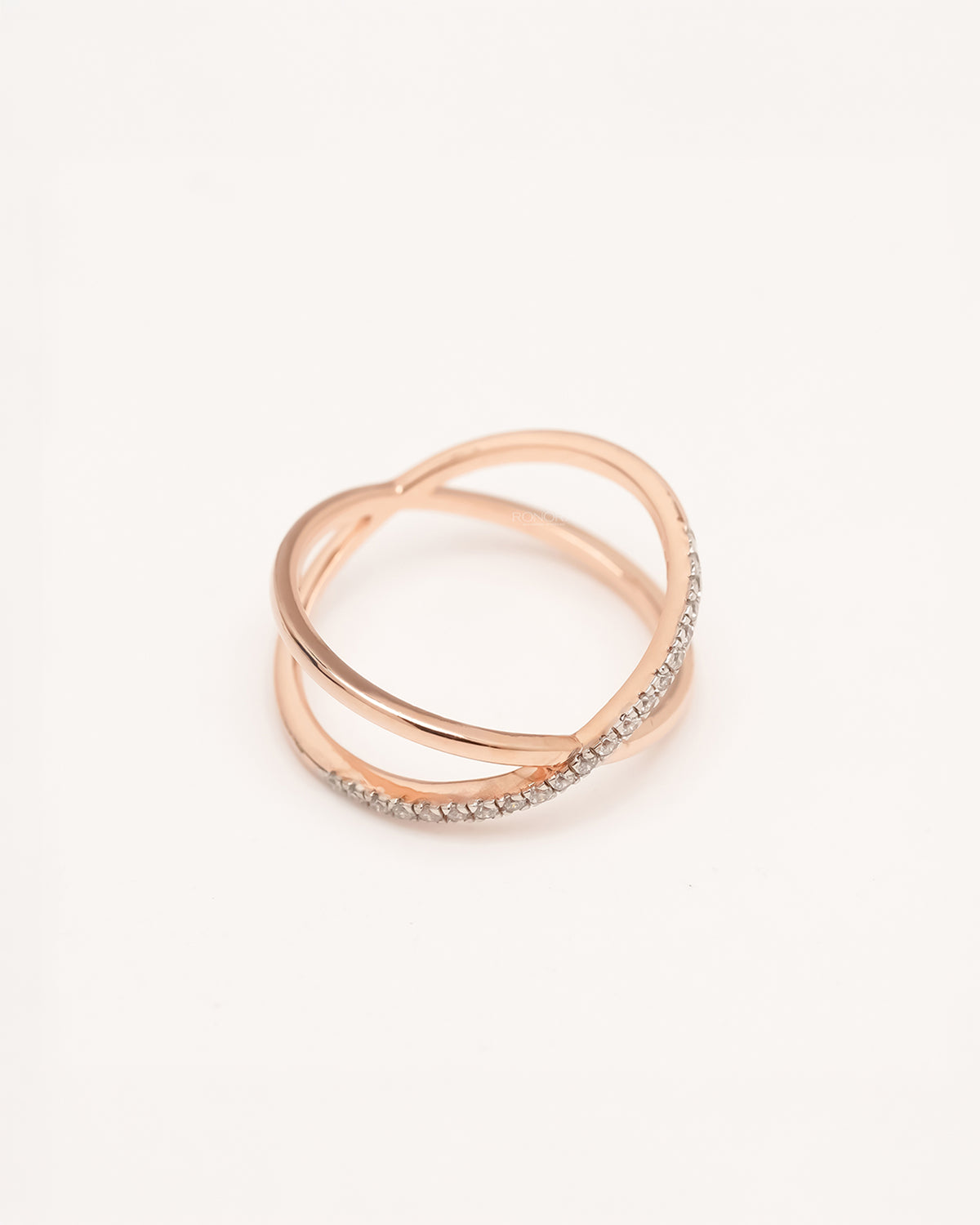 Back view of twisted lab grown diamond crossover ring showing open band structure