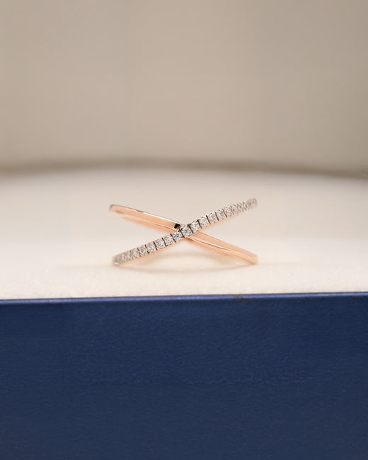 Vespera twisted lab grown diamond pavé crossover ring in rose gold inside Ronora box