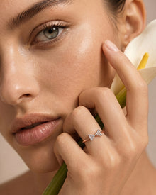 Round pave lab grown diamond cluster ring worn on hand in rose gold - Ronora