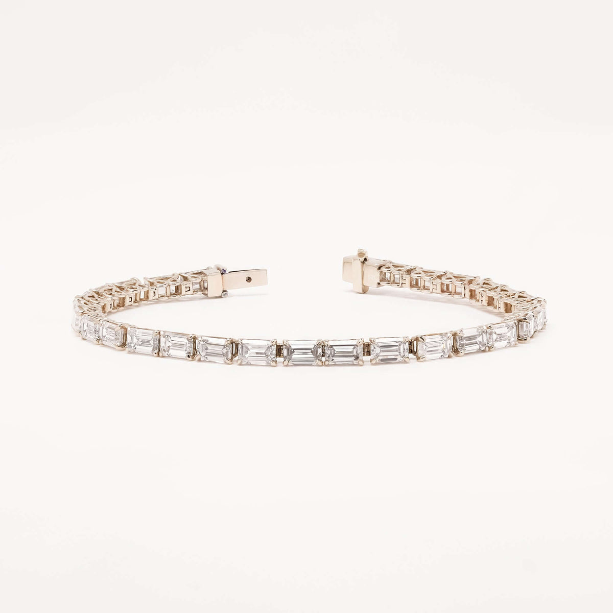 Emerald cut lab grown diamond tennis bracelet on white background
