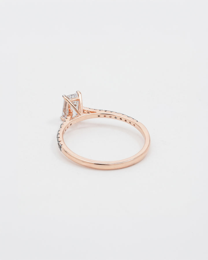 Back view of emerald cut moissanite pave ring showing band detail