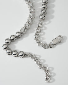 Lobster clasp and adjustable extender chain of a white gold lab grown diamond tennis necklace
