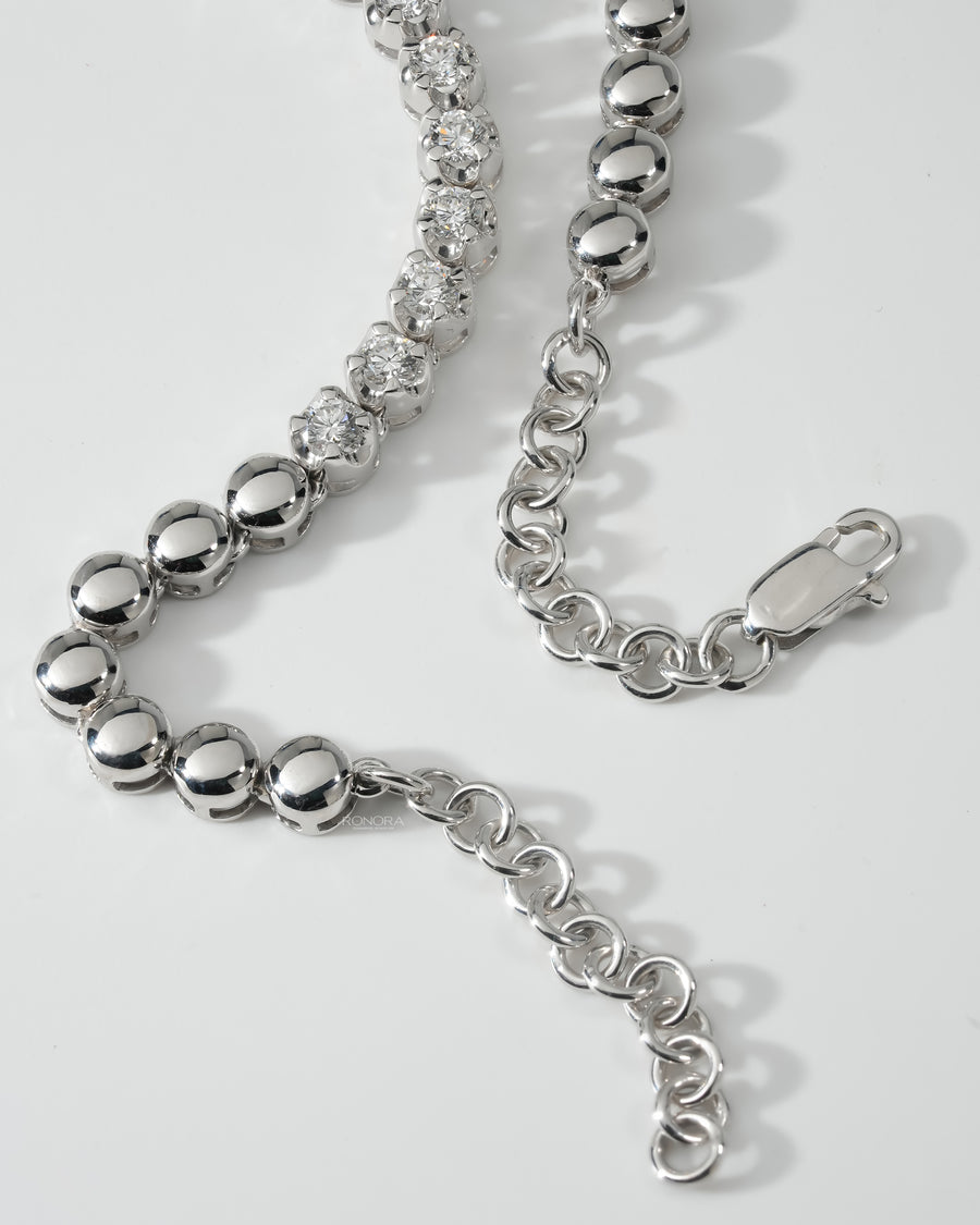 Lobster clasp and adjustable extender chain of a white gold lab grown diamond tennis necklace