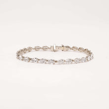 Caliane pear lab grown diamond tennis bracelet on white background
