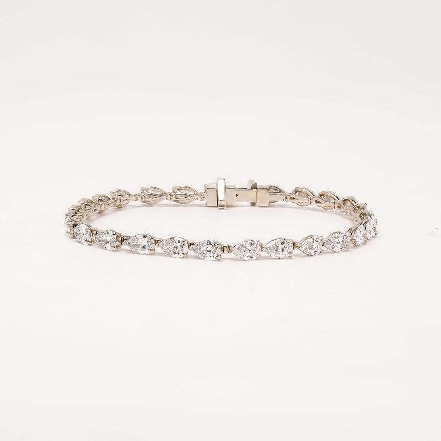 Caliane pear lab grown diamond tennis bracelet on white background