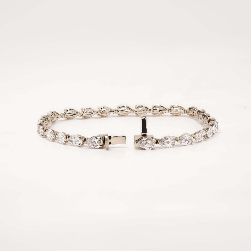 Open pear lab grown diamond tennis bracelet with clasp