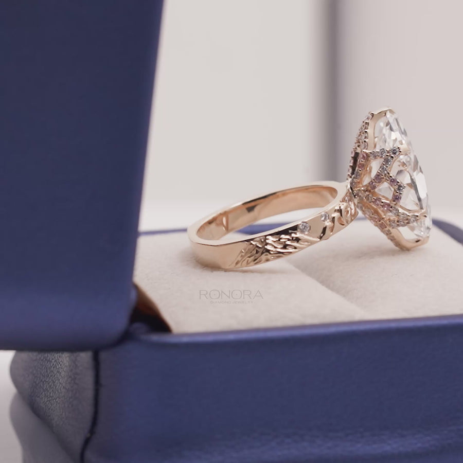 Close-up video of marquise lab grown diamond vintage halo ring in yellow gold