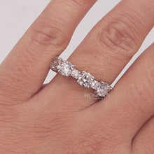 Close-up video of round lab grown diamond eternity band in white gold