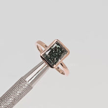 Close-up video of green radiant lab grown diamond solitaire ring in rose gold