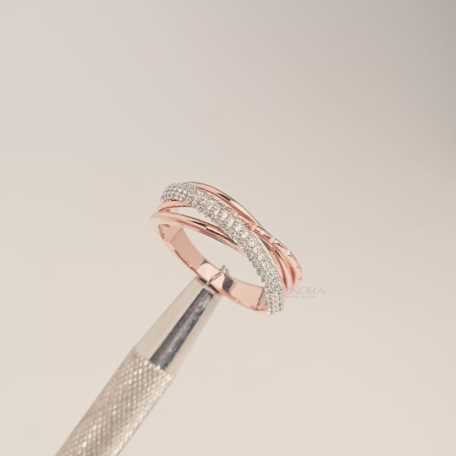 Close-up video of multi-row lab grown diamond pavé band in rose gold