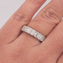 Close-up video of emerald lab grown diamond eternity band in white gold