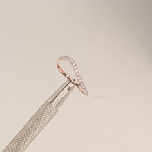 Close-up video of slim rose gold curved lab grown diamond pavé band