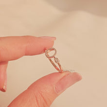 Close-up video of round lab grown diamond open halo ring in rose gold