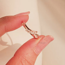 Close-up video of marquise lab grown diamond curved ring in rose gold
