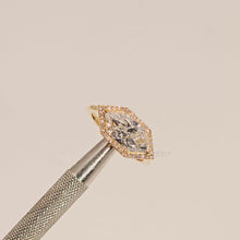 Close-up video of yellow gold marquise lab grown diamond halo ring