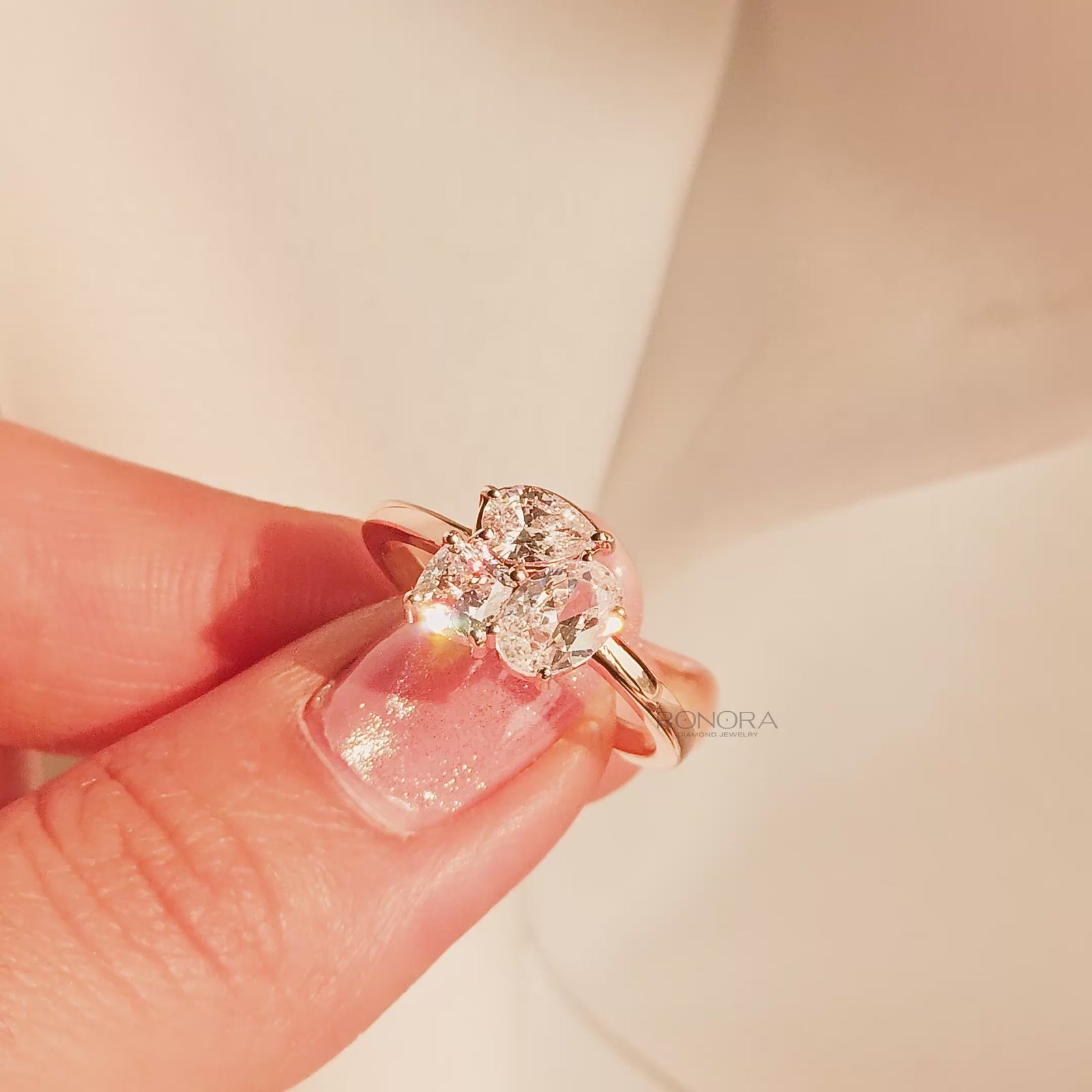Close-up video of oval lab grown diamond cluster ring in rose gold