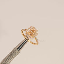 Close-up video of yellow radiant lab grown diamond halo ring in yellow gold
