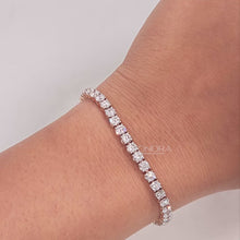 Video of round lab grown diamond tennis bracelet on wrist