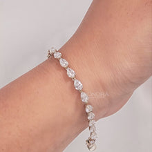 Video of pear lab grown diamond tennis bracelet on wrist
