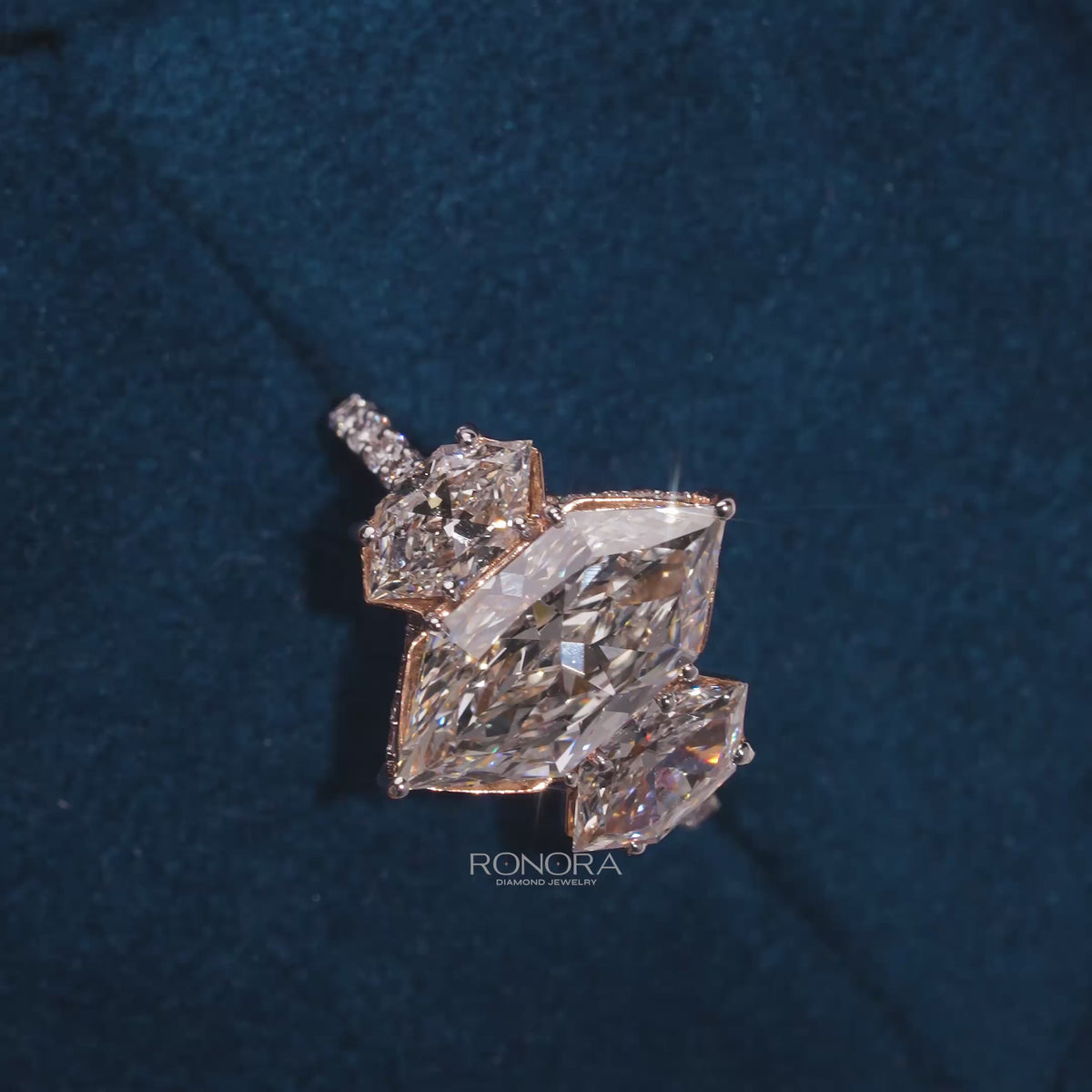 Close-up video of marquise lab grown diamond three-stone ring in white gold