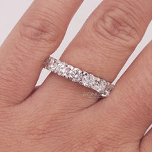 Close-up video of round lab grown diamond eternity band in white gold