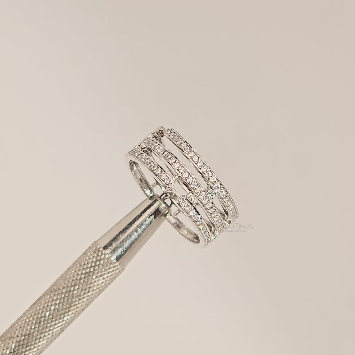 Close-up video of wide lab grown diamond pavé band in white metal