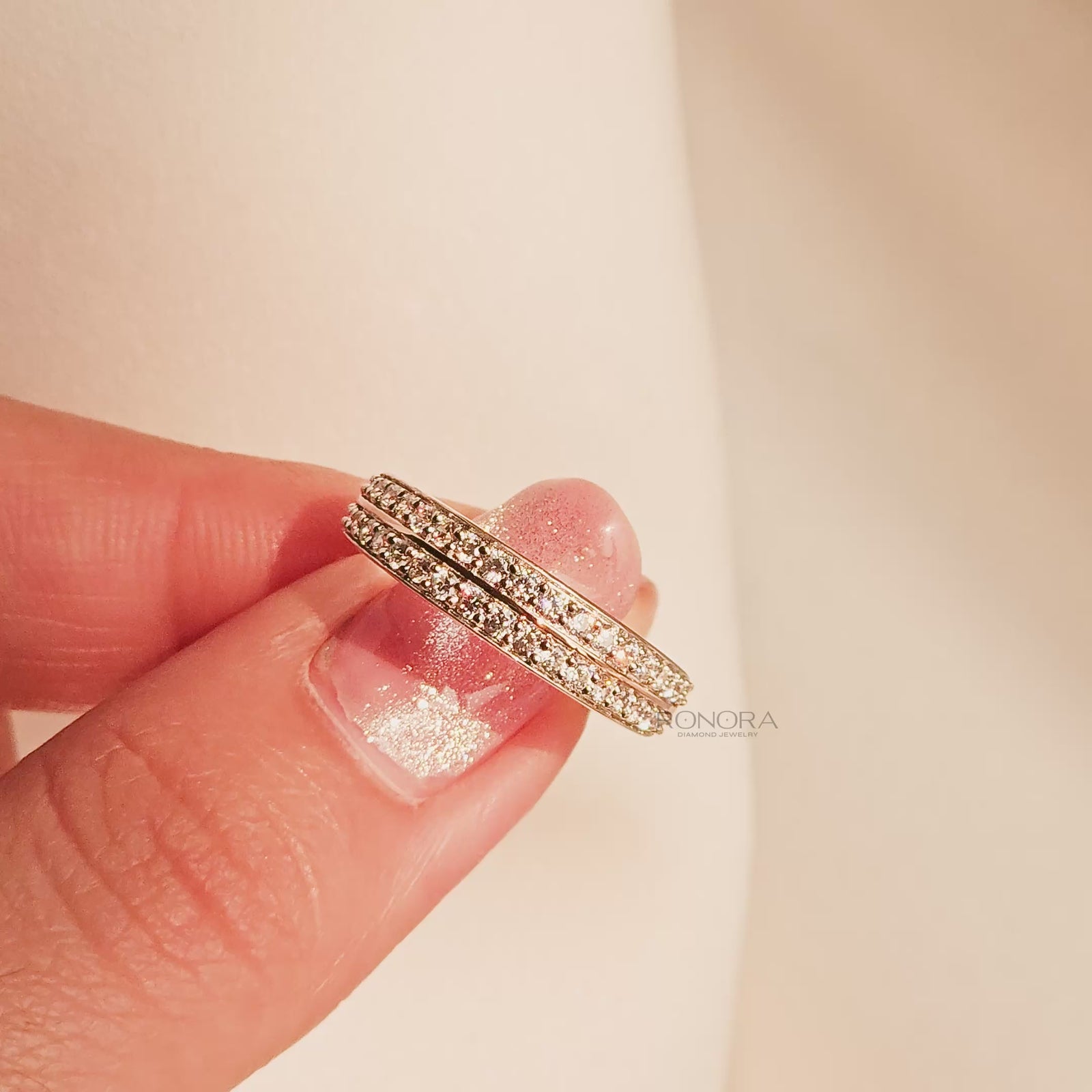 Close-up video of double-row lab grown diamond pavé band in rose gold