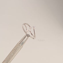 Close-up video of open bypass lab grown diamond ring with four round stones