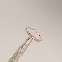 Close-up video of open rose gold lab grown diamond bypass ring