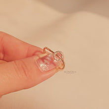 Close-up video of round lab grown diamond bypass ring in rose gold