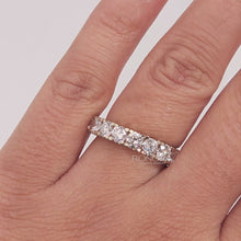 Close-up video of round lab grown diamond eternity band in white gold