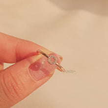 Close-up video of round lab grown diamond halo ring in rose gold