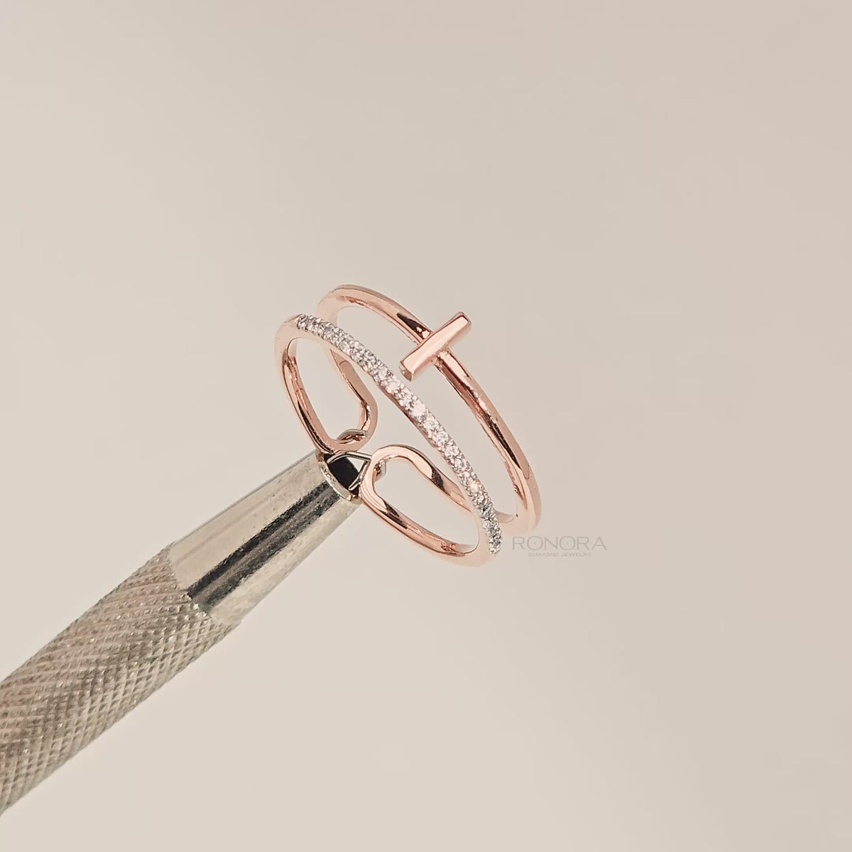 Close-up video of open bar lab grown diamond bypass ring in rose gold