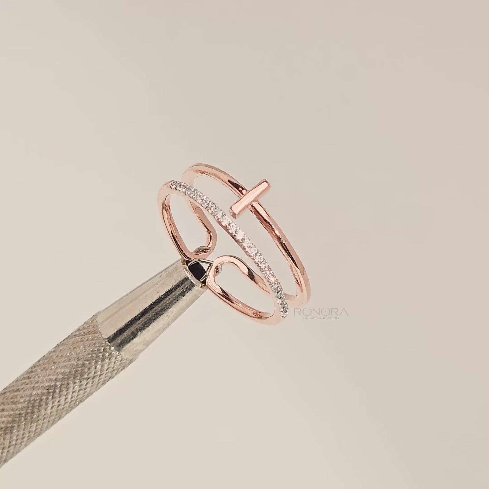 Close-up video of open bar lab grown diamond bypass ring in rose gold