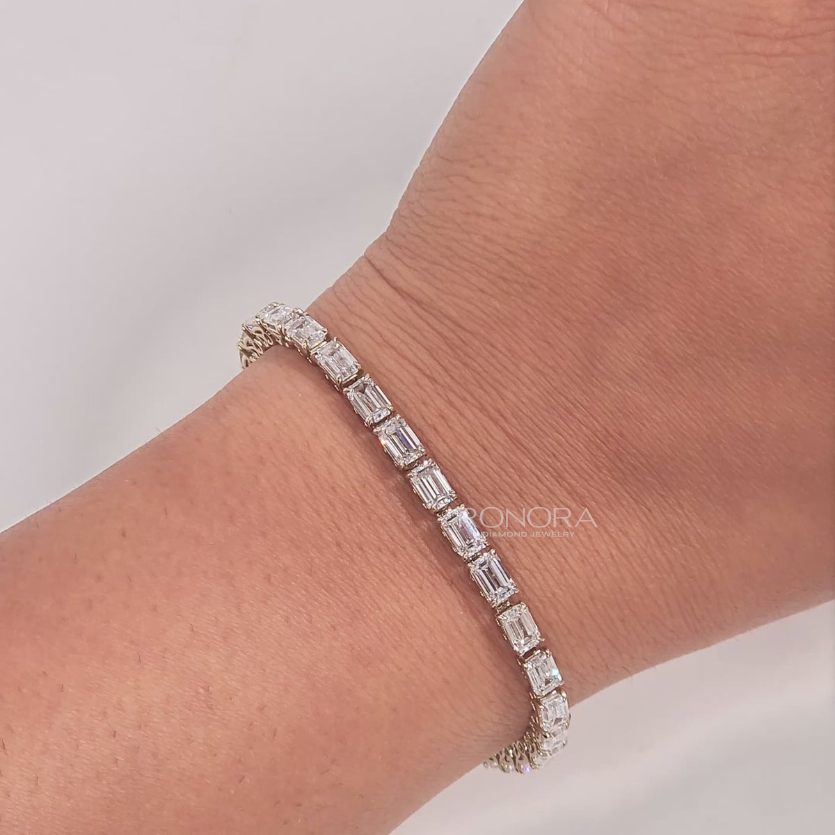 Video of emerald lab grown diamond tennis bracelet on wrist