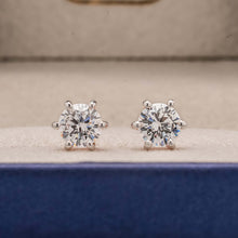 Front view of round lab grown diamond stud earrings inside Ronora box